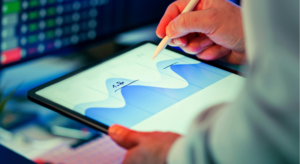 A person analyzing their AI-driven dashboard data on their tablet.