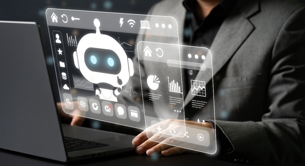 Close-up of a professional working at a laptop with futuristic holographic interfaces floating above the keyboard showing an AI assistant icon, charts, and data metrics.